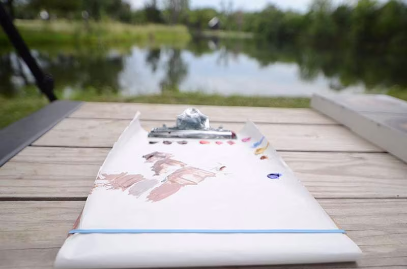 Oil paint on a paper painting palette